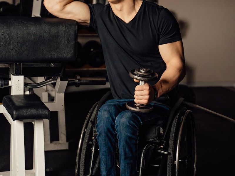 Man holding dumbbells ready to start a workout set
